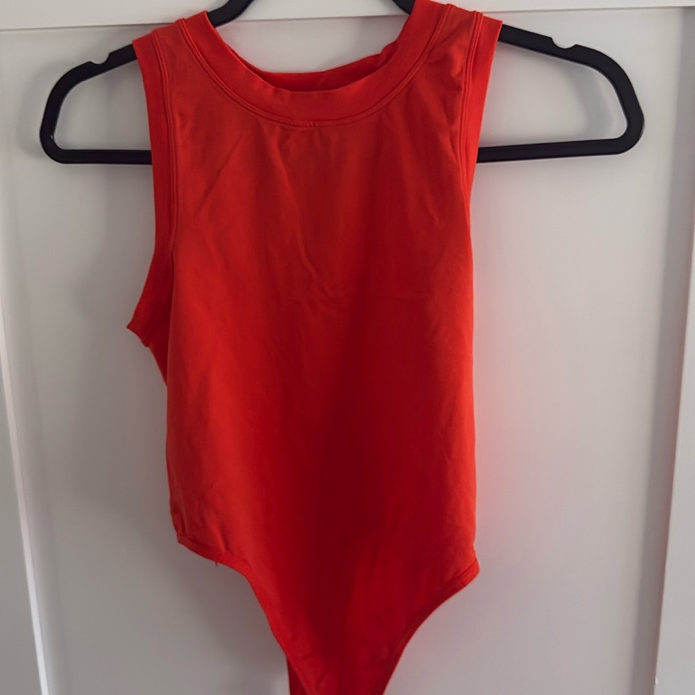 Orange bodysuit